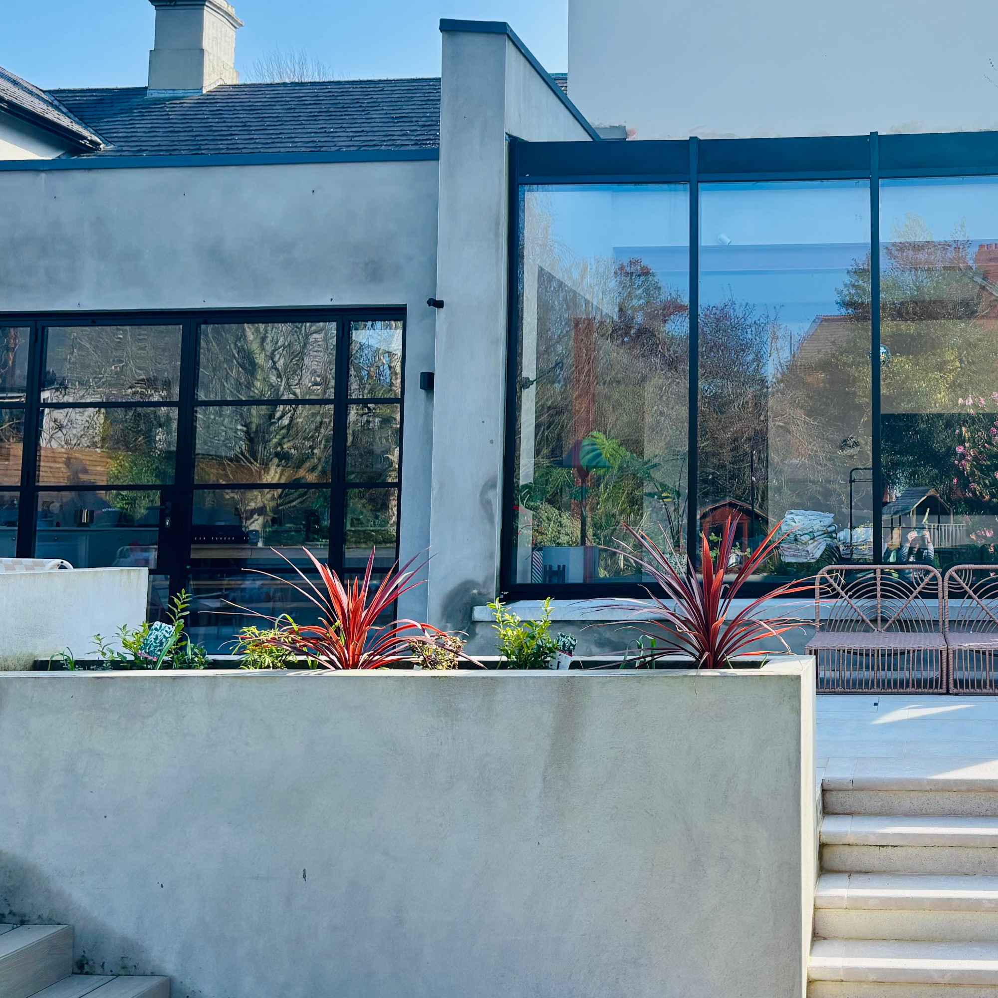 planter on a patio attached to house