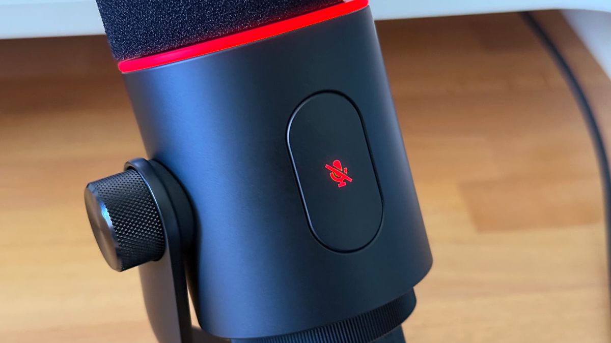 Razer Seiren V3 Pro microphone on wooden desk