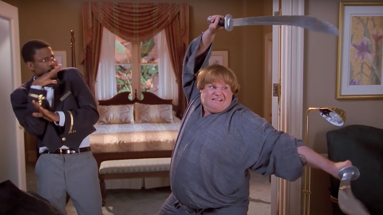 Chris Rock backing away from Chris Farley holding swords in Beverly Hills Ninja.