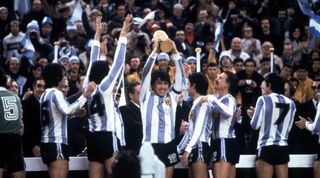 Argentina's players celebrate with the trophy after winning the 1978 FIFA World Cup in Argentina