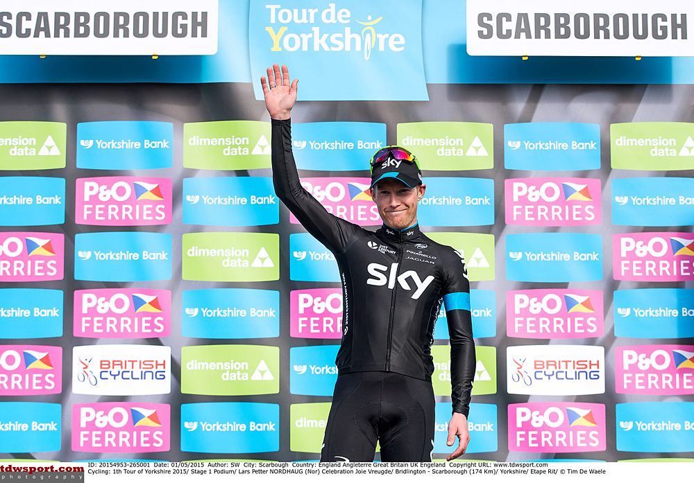 Lars Petter Nordhaug (Team Sky) celebrates his stage 1 win on the podium