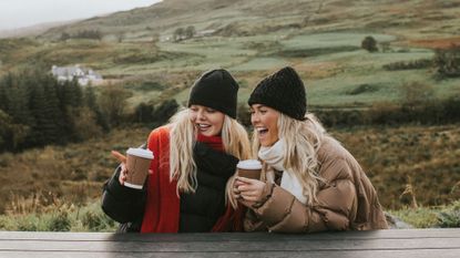 Two women on an autumn walk in the countryside