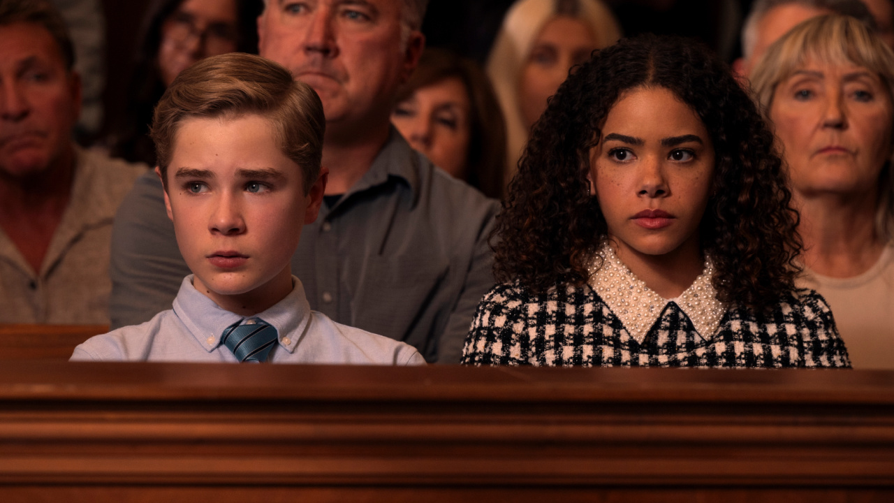 Ginny & Austin sitting in a courtroom in Ginny & Georgia Season 3.