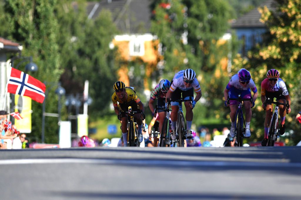MYSEN NORWAY AUGUST 12 LR Anouska Helena Koster of Netherlands and Jumbo Visma Team Alice Barnes of United Kingdom and Team CanyonSRAM Racing Chloe Hosking of Australia and Team Trek Segafredo Alexandra Manly of Australia and Team BikeExchange Jayco and Laura Tomasi of Italy and UAE Team Adq sprint at finish line during the 8th Tour of Scandinavia 2022 Battle Of The North Stage 4 a 1192km stage from Askim to Mysen UCIWWT tourofscandinavia TOSC22 on August 12 2022 in Mysen Norway Photo by Luc ClaessenGetty Images