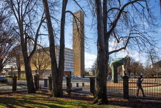 photograph of Columbus First Christian Church Tower by Saarinen between trees