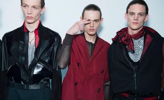 3 male models in black & red clothing