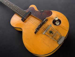 George Harrison's Hofner Club 40, which was autographed with all four of The Beatles' names by their road manager, Neil Aspinall.