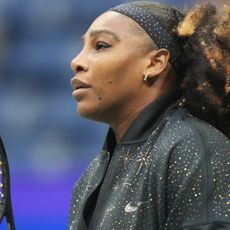Serena Williams competes at her final US Open wearing a sparkly black jacket and matching headband