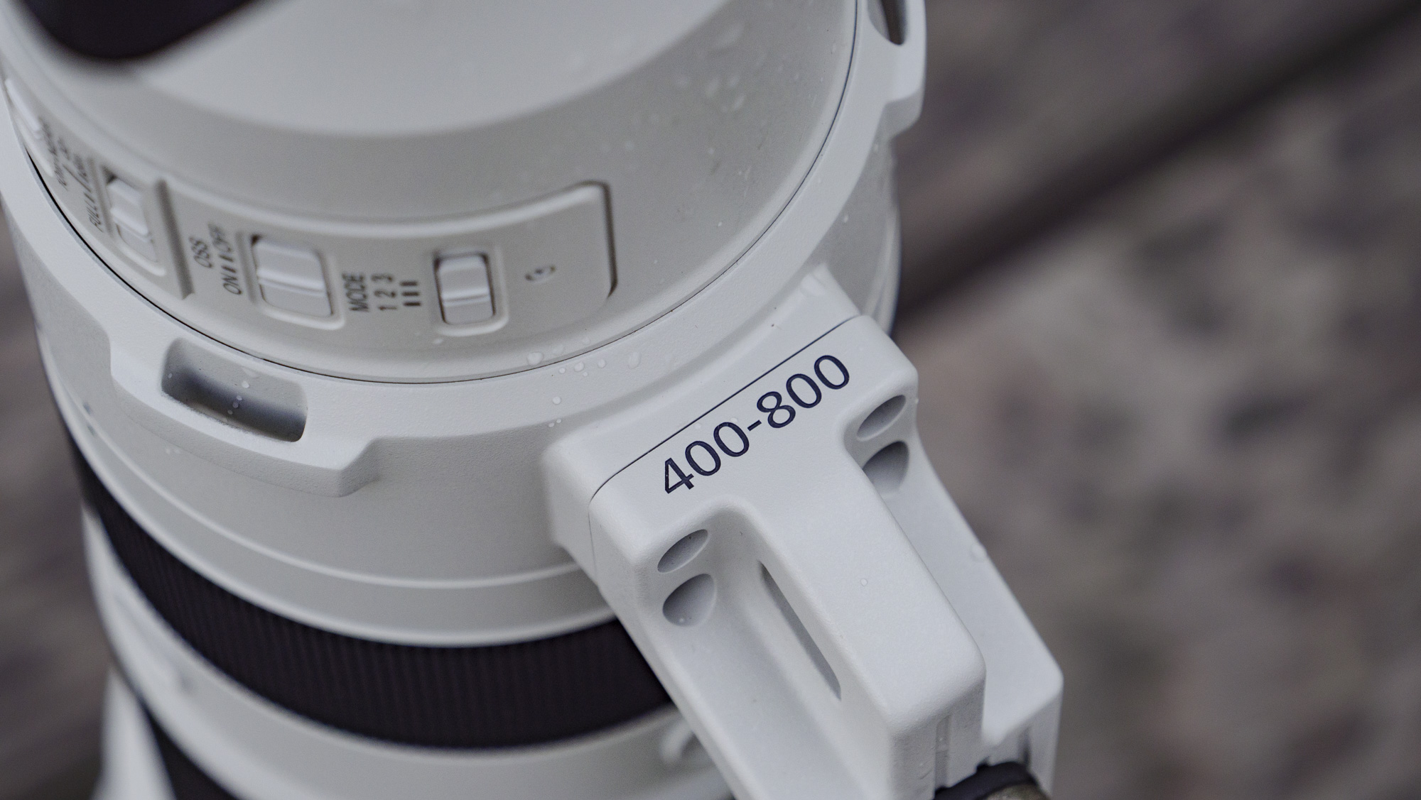 Closeup of the Sony FE 400-800mm F6.3-8 G OSS supertelephoto zoom lens's tripod collar