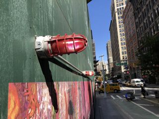 Red light, green wall