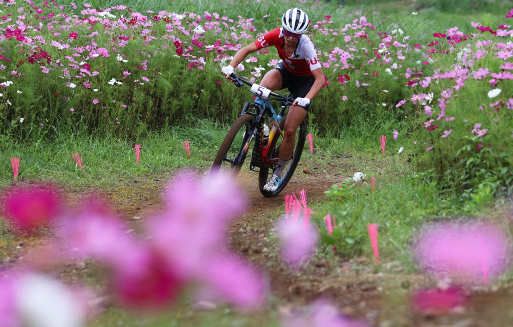 IZU JAPAN JULY 27 Jolanda Neff of Team Switzerland rides through flowery landscape during the Womens Crosscountry race on day four of the Tokyo 2020 Olympic Games at Izu Mountain Bike Course on July 27 2021 in Izu Shizuoka Japan Photo by Michael SteeleGetty Images