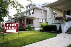 Home For Rent Sign in Front of Beautiful American Home 