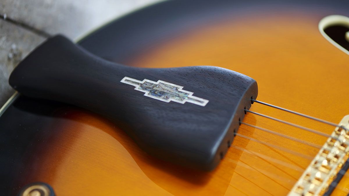 The LGB's fetching tailpiece is made from ebony and finished with a stylish art deco- style abalone inlay