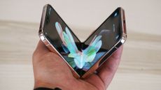 Samsung Galaxy Z Flip 4 hands on beige V angled