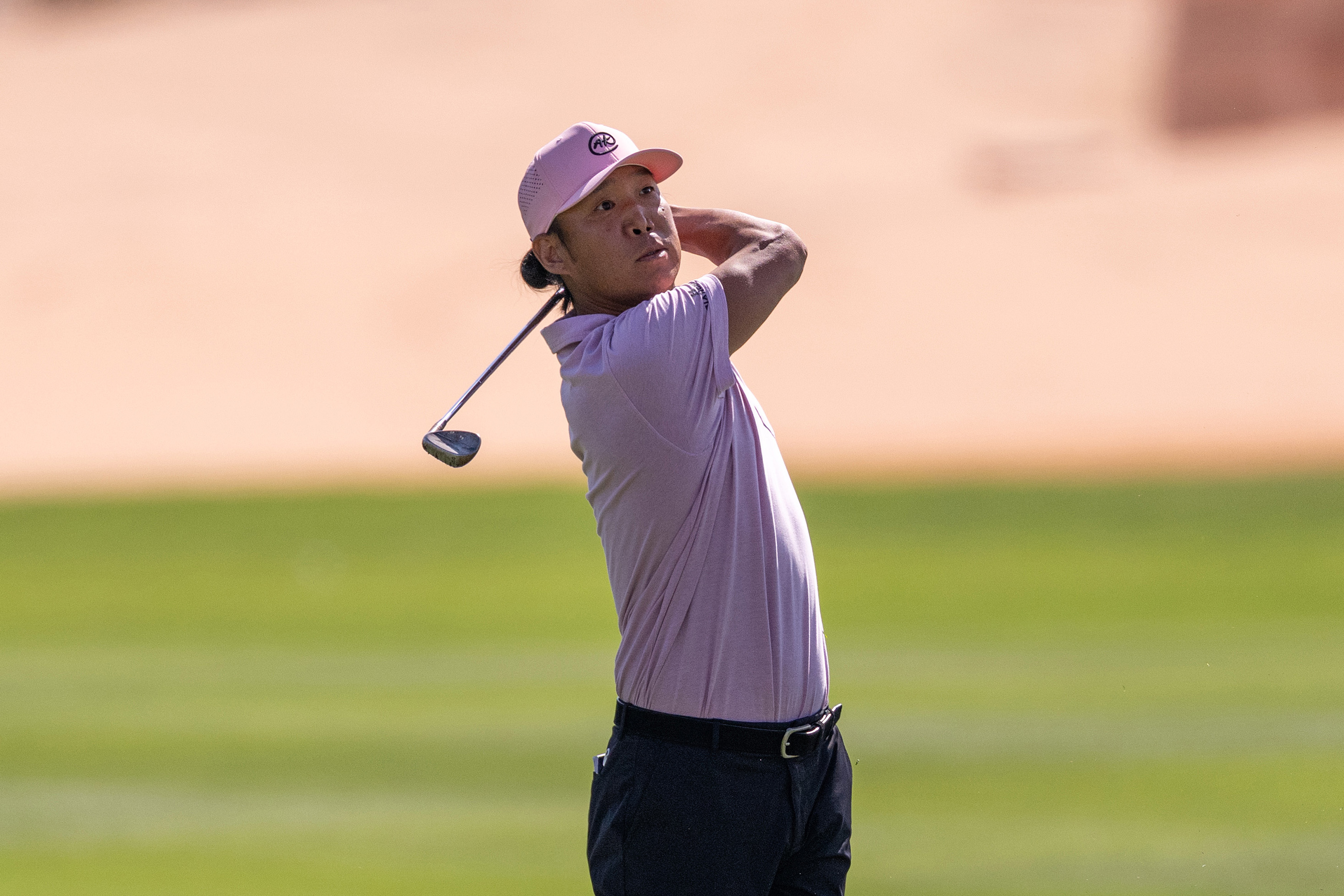 Anthony Kim hits a wedge shot
