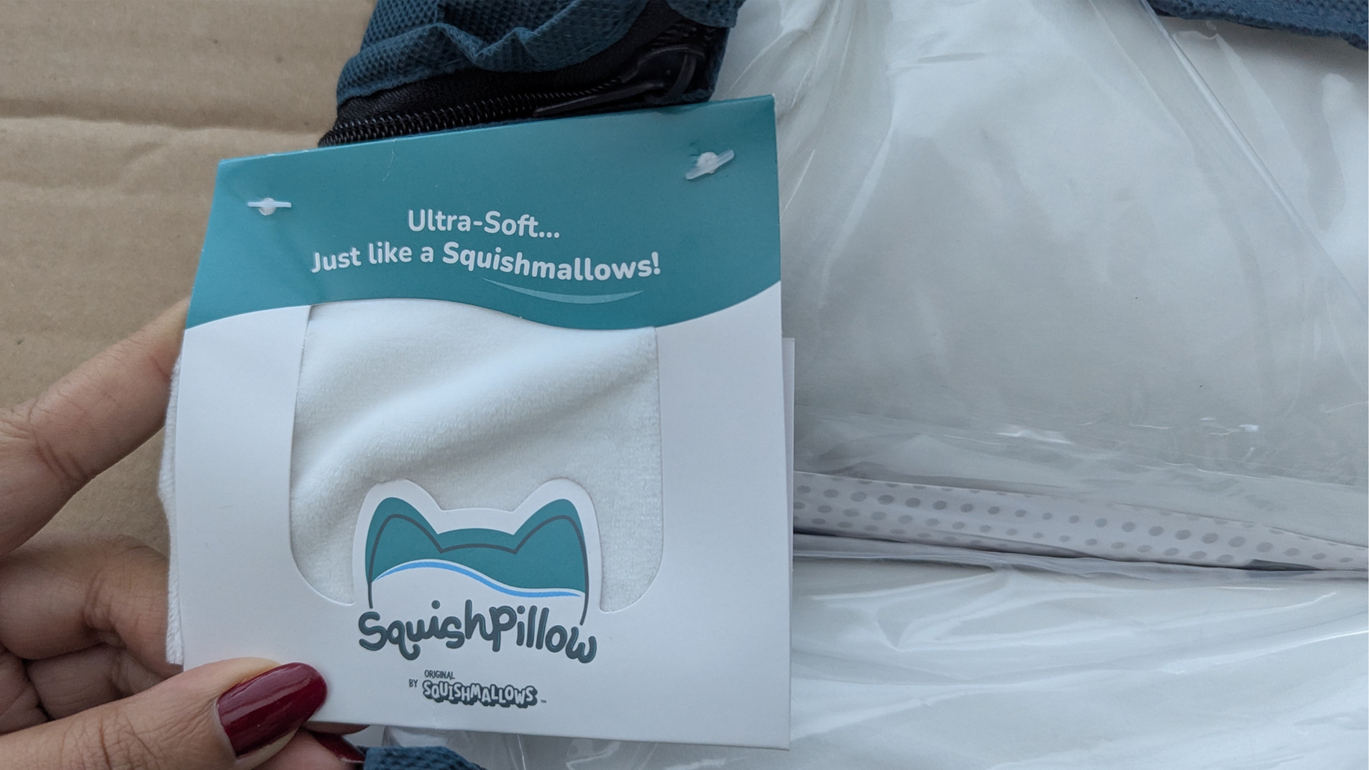 A close-up shot of the tag that includes a piece of the velvety fabric cover