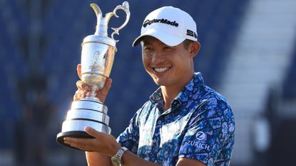 Collin Morikawa celebrates with the Claret Jug after winning The Open 