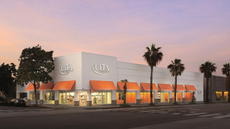 An image of an Ulta storefront at dusk.