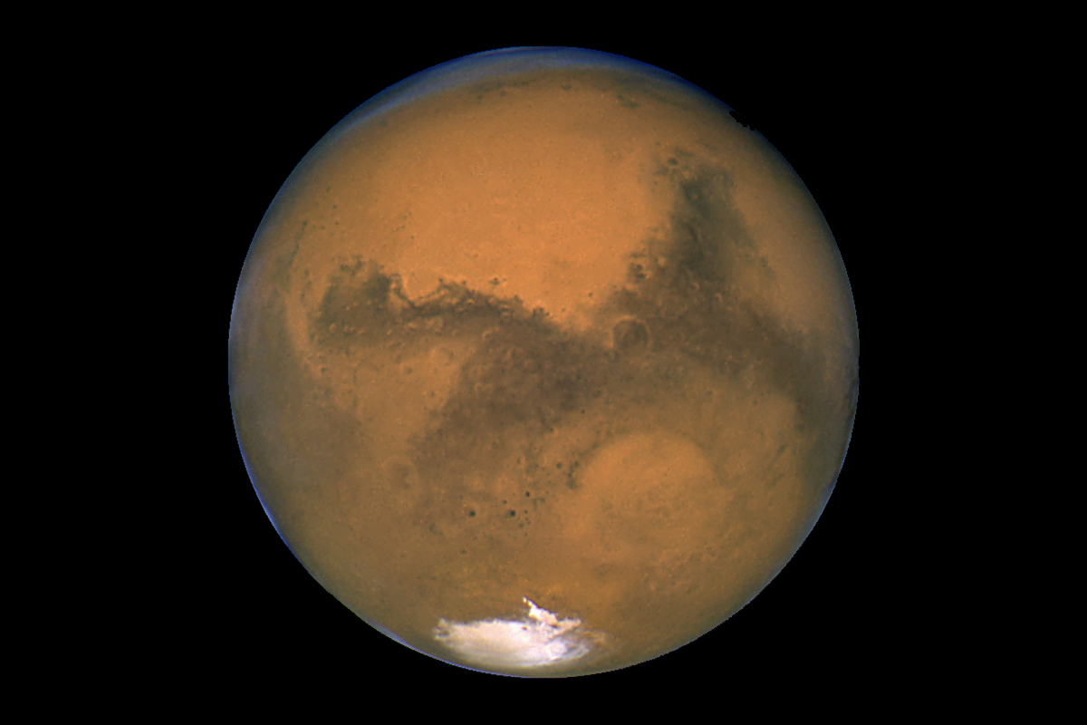 Mars, the Red Planet, may seem beyond reach in this view from NASA's Hubble Space Telescope in 2003. But the space company Uwingu has launched a Beam Me to Mars project to let the public send messages to the Red Planet in order to raise funds for space exploration.