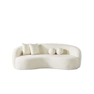 white curved sofa 