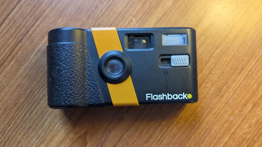 Flashback ONE35 redisposable digital camera on a wooden surface