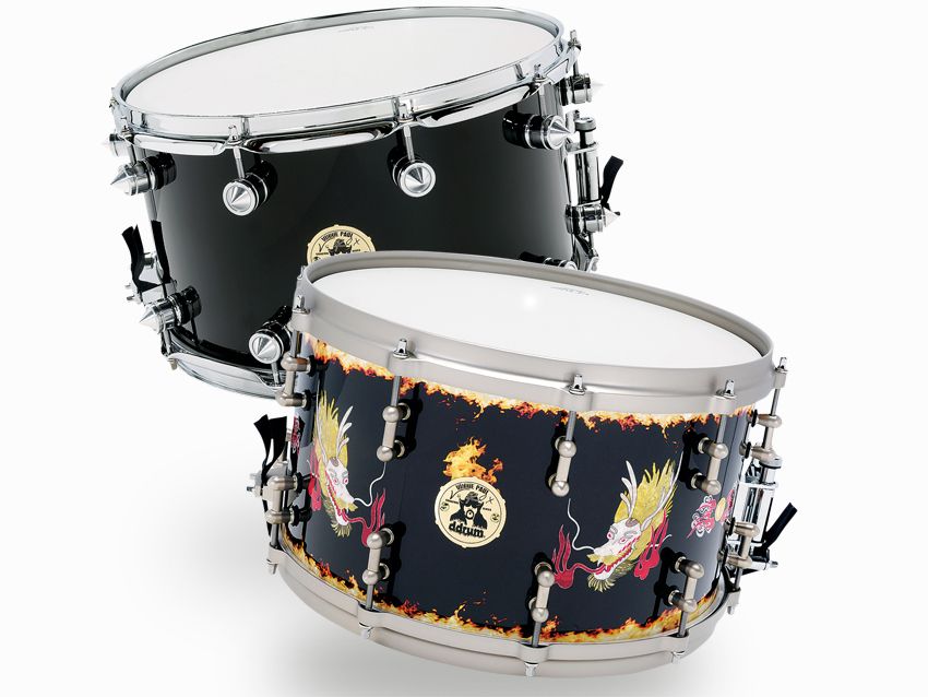 The mass of the spiked lugs calm the resonance of the drum