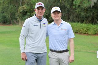 Jim and Tanner Furyk pose for a photo at the PNC Championship