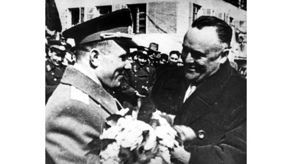 The first human ever to fly in space, cosmonaut Yuri Gagarin (left), meets with spacecraft designer Sergei Korolev.