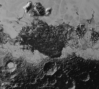 The dark ridges in the center of this view, near the bottom of Sputnik Planum, suggest possible windswept dunes. Also visible is old, cratered terrain juxtaposed with new, smooth ground, as well as mountains.