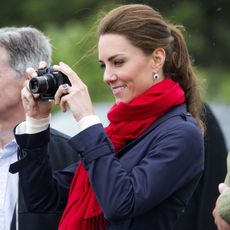 charlottetown, pe july 04 catherine, duchess of cambridge takes photographs as prince william, duke of cambridge takes part in helicopter manouvres called water birding across dalvay lake on july 4, 2011 in charlottetown, canada the newly married royal couple are on the fifth day of their first joint overseas tour the 12 day visit to north america is taking in some of the more remote areas of the country such as prince edward island, yellowknife and calgary the royal couple started off their tour by joining millions of canadians in taking part in canada day celebrations which mark canadas 144th birthday photo by arthur edwards poolgetty images