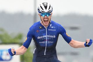 Remi Cavagna from Deceunick QuickStep team jubilates as he wins the French cycling championship in Epinal eastern France on June 20 2021 Photo by SEBASTIEN BOZON AFP Photo by SEBASTIEN BOZONAFP via Getty Images