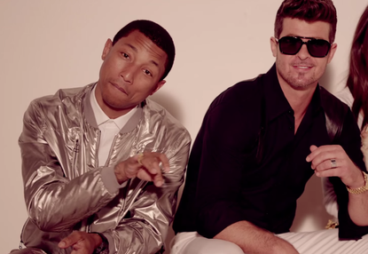 Williams and Thicke in the music video for "Blurred Lines"