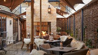 The courtyard and fire at Wild Thyme & Honey