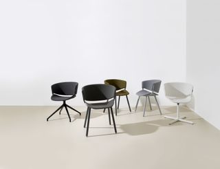 Black, brown, white and grey chairs made from recycled aluminum and plastic