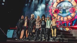 Guns N' Roses take a bow onstage