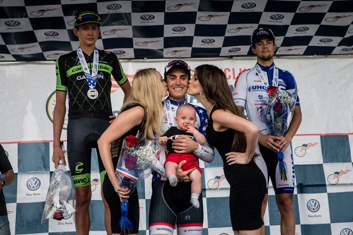 Matt Busche (Trek) gets the kisses for taking the win.