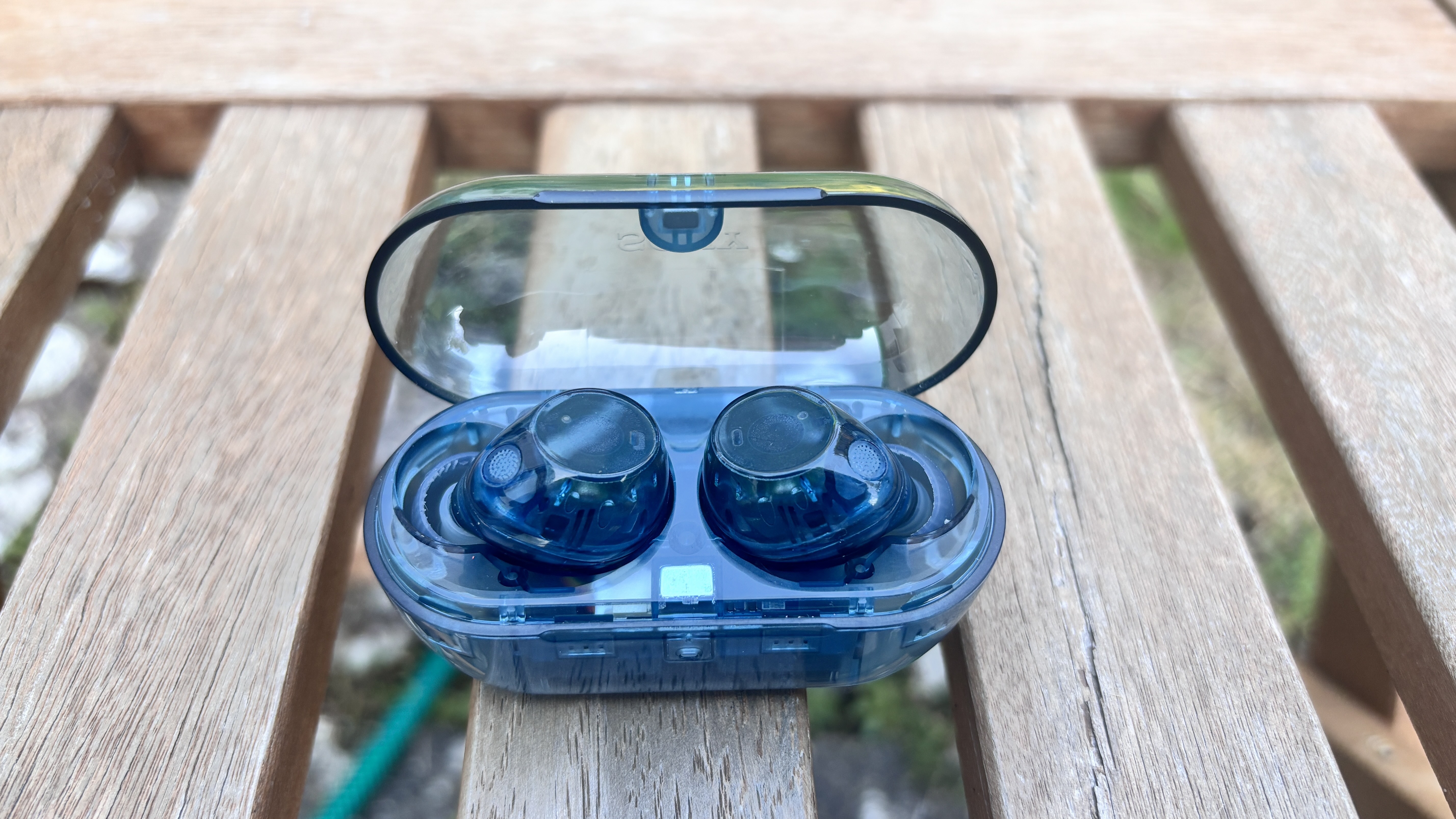 Sony WF-C710N in a blue transparent case