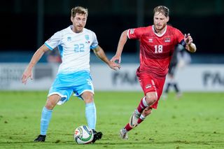 San Marino, San Marino - September 5: Nicolas Hasler of Liechtenstein and Marcello Mularoni of San Marino compete for the ball during the UEFA Nations League 2024/2025 League D - Group 1 match between San Marino and Liechtenstein at San Marino Stadium on September 5, 2024 in San Marino, San Marino. (Photo by Giuseppe Maffia/DeFodi Images via Getty Images)