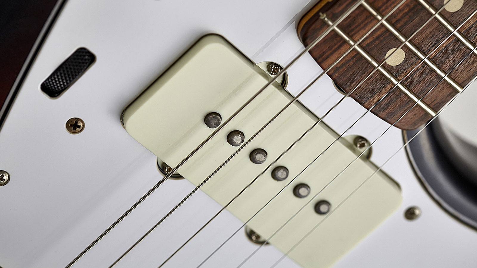 The pickups and knobs have had the relic treatment, too