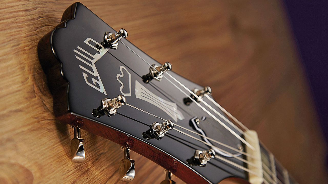 Guild's classic 'centre- raised' headstock appeared around 1962, and replaced the previous Gibson-like 'lip top' design