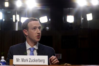 Zuckerberg tells senators Facebook "didn't do enough" to protect privacy.