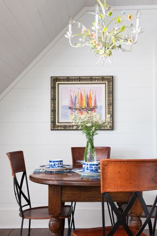 A dining room with farmhouse style table