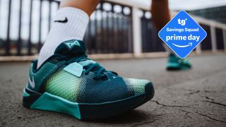 Nike Metcon 10 in teal with a deal badge top right