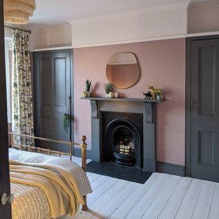 Pink bedroom with fireplace in sulking room pink
