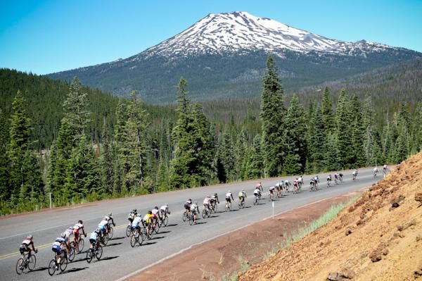 Early in the day the bunch descends towards Mt. Bachelor in the distance