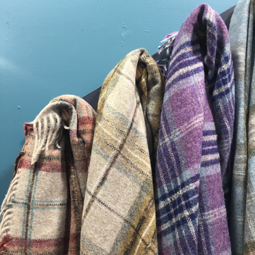 clothes with hanger and blue walls