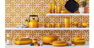New Le Creuset Nectar colourway shownon stoneware collection on kitchen shelves