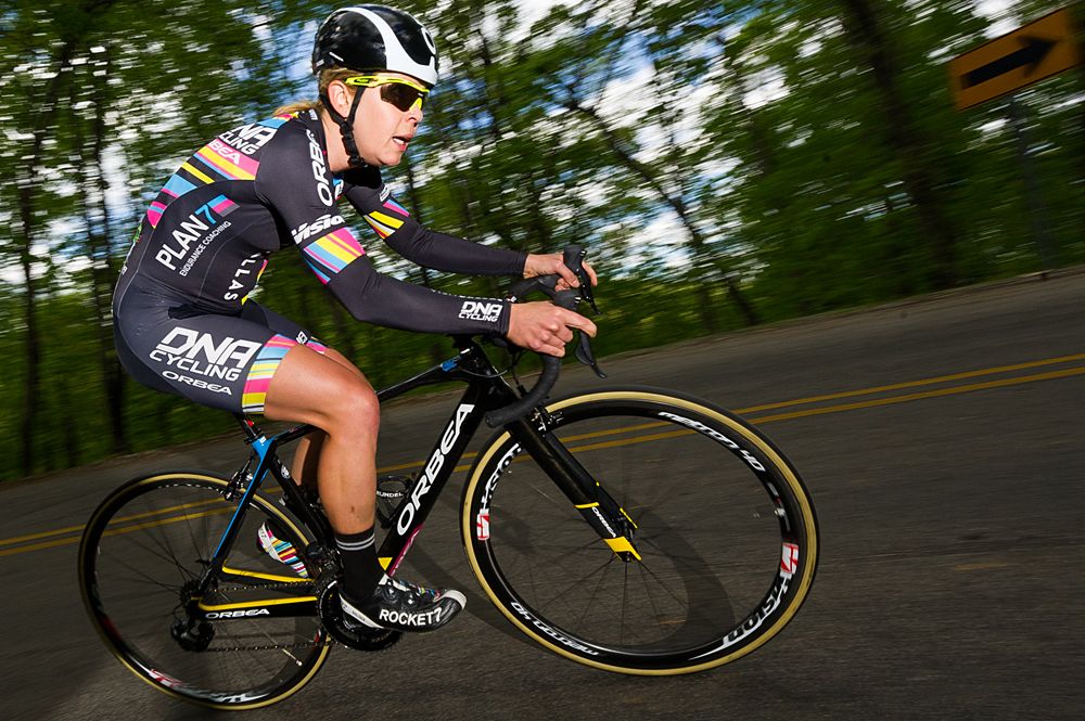 A Visit Dallas Cycling DNA Pro Cycling (USA) looks up the road while taking on a switchback.