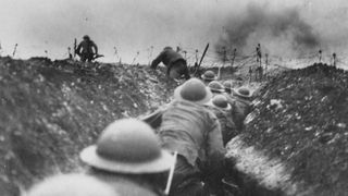 British soldiers attack from a trench.