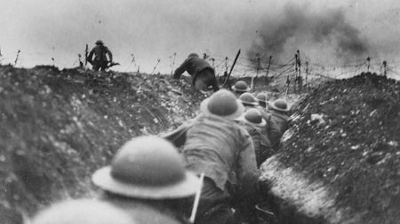 British soldiers attack from a trench. 
